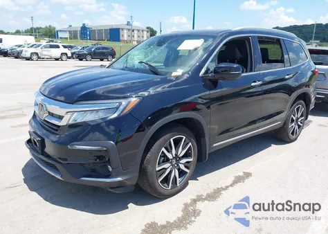 2022 Honda Pilot Touring z USA, uszkodzony, nr VIN 5FNYF6H63NB075135